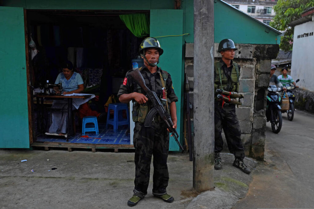 KIA soldiers stand guard in downtown Laiza in Kachin State.